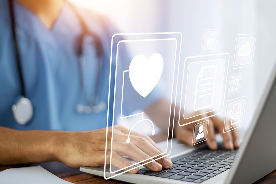 Doctor using technology document management on computer system management for cardiologist Specialist in treating heart disease for treatment in hospital , DMS document management concept Doctor using technology document management on computer system management for cardiologist Specialist in treating heart disease for treatment in hospital , DMS document management concept